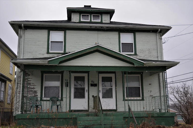Two-story duplex with two front doors